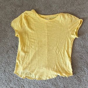 Free people yellow tee with ruffle bottom